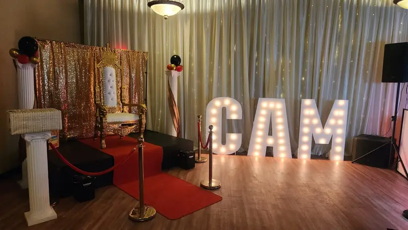 Studio 78 with marquee letters, a red carpet and a stage